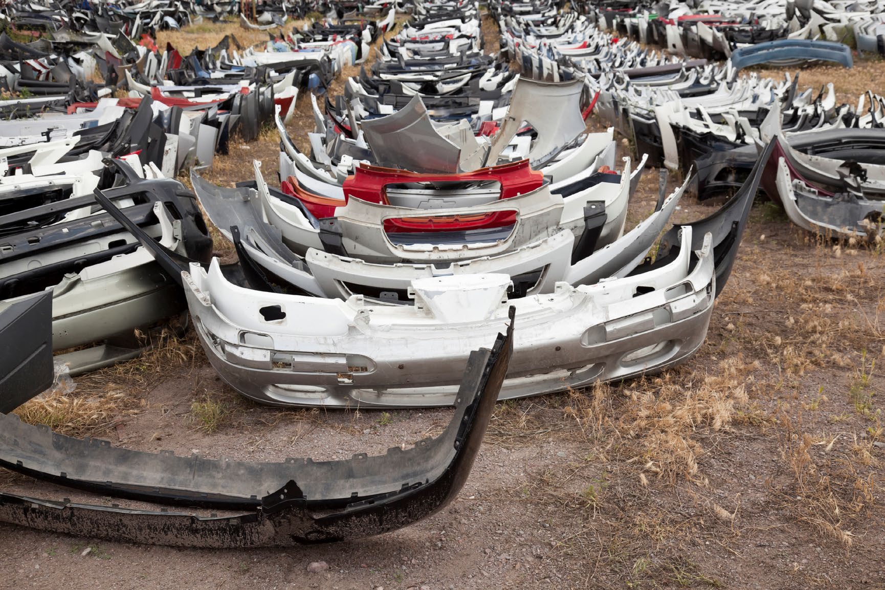Automotive bumpers being recycled
